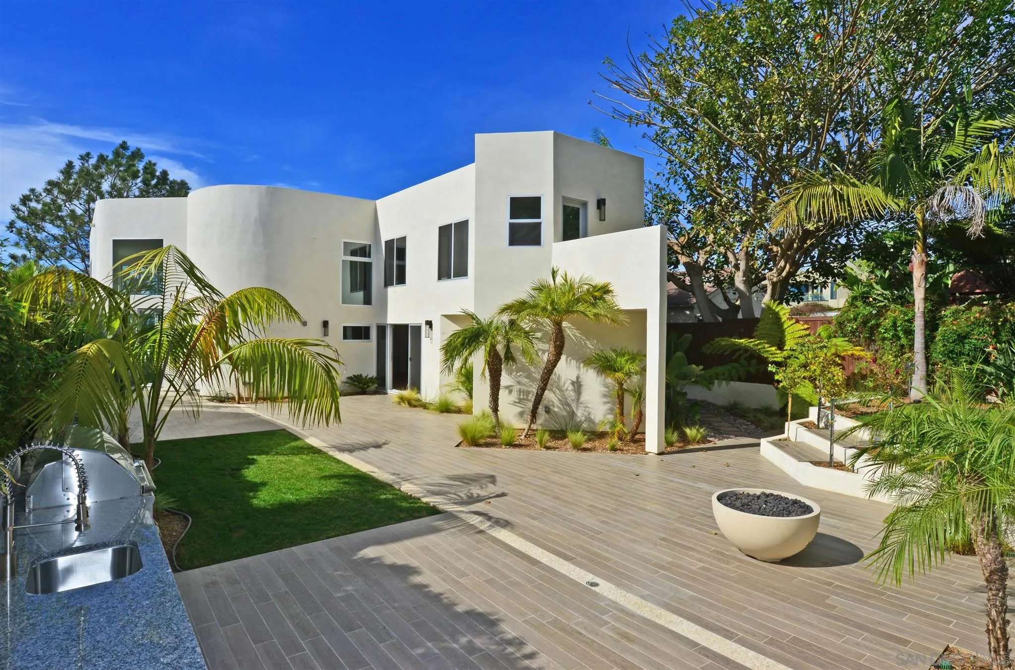 13721 Pine Needles Drive Del Mar, CA 92014 - Photo 28 of 32 a front view of house with yard and seating area