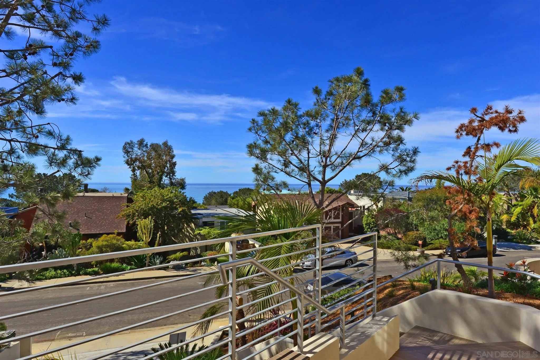 13721 Pine Needles Drive Del Mar, CA 92014 - Photo 3 of 32 a view of a house with a street