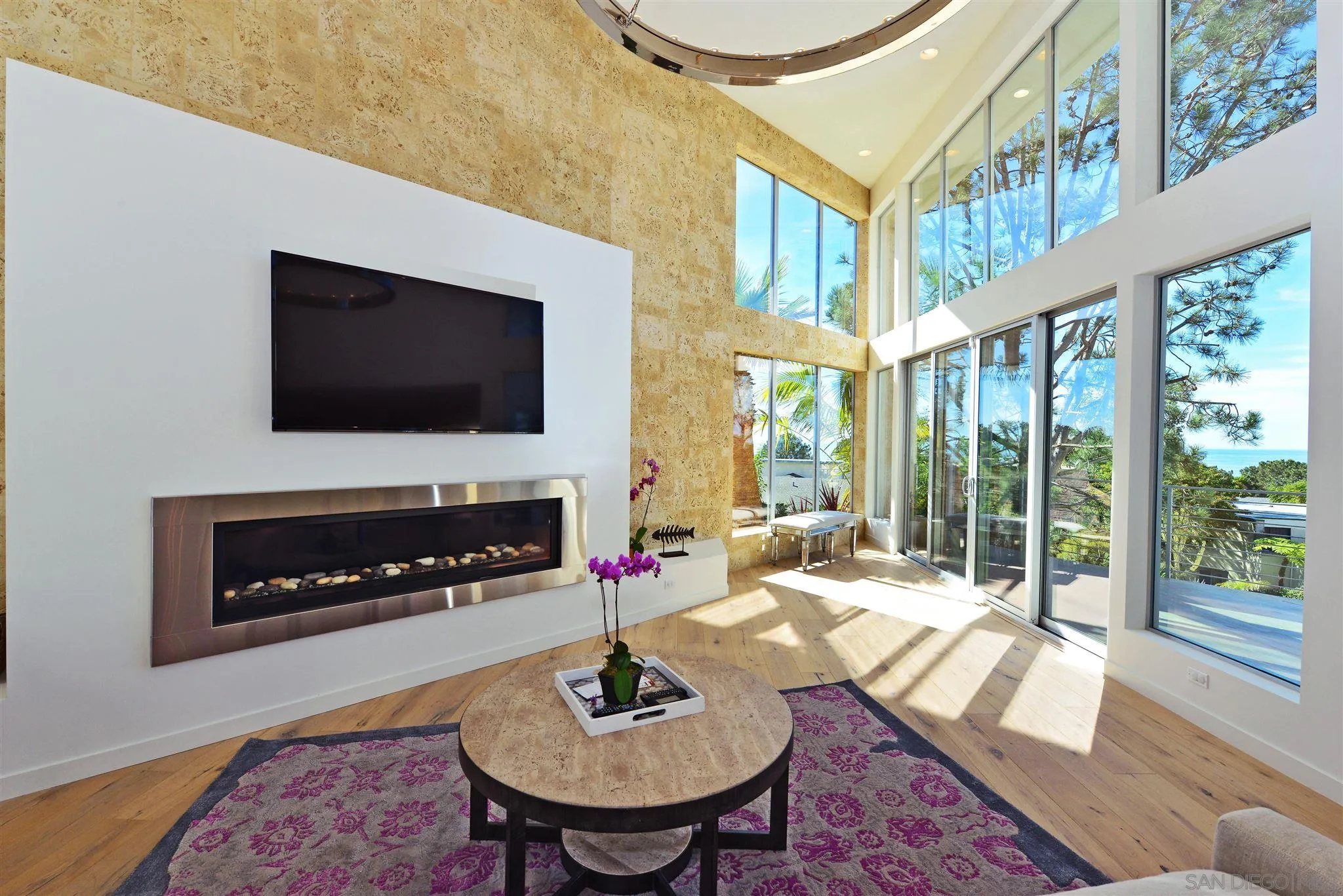 13721 Pine Needles Drive Del Mar, CA 92014 - Photo 8 of 32 a living room with fireplace furniture and a flat screen tv