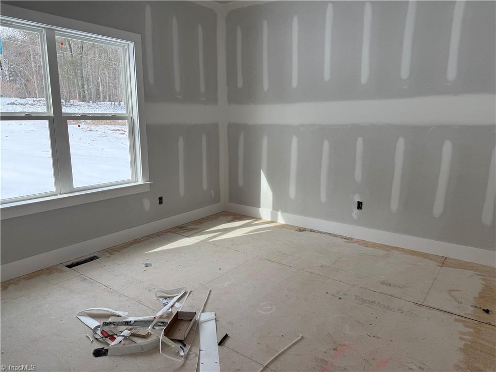 221 Fisher Road Madison, NC 27025 - Photo 8 of 10 1 of the 2nd bedrooms