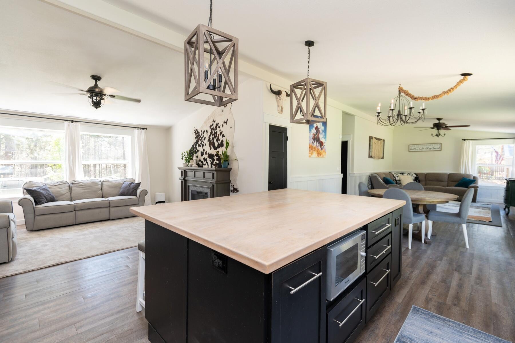 16990 Covina Road Bend, OR 97707 - Photo 9 of 56 a view of a kitchen and dining room