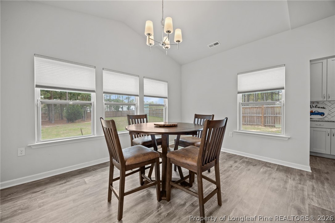 334 Beacon Hl Road Lillington, NC 27546 - Photo 17 of 49 a view of a dining room with furniture window and outside view