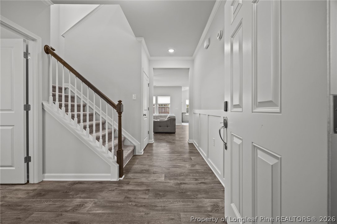 334 Beacon Hl Road Lillington, NC 27546 - Photo 4 of 49 a view of a hallway with wooden floor and entryway