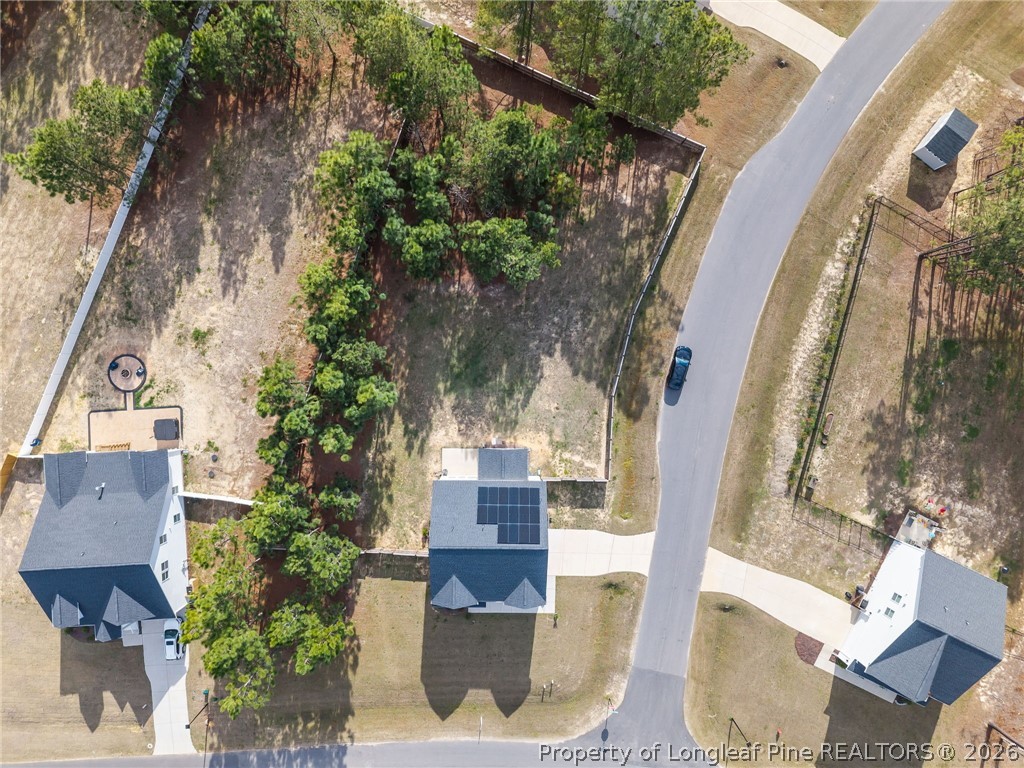 334 Beacon Hl Road Lillington, NC 27546 - Photo 48 of 49 an aerial view of a house with a yard