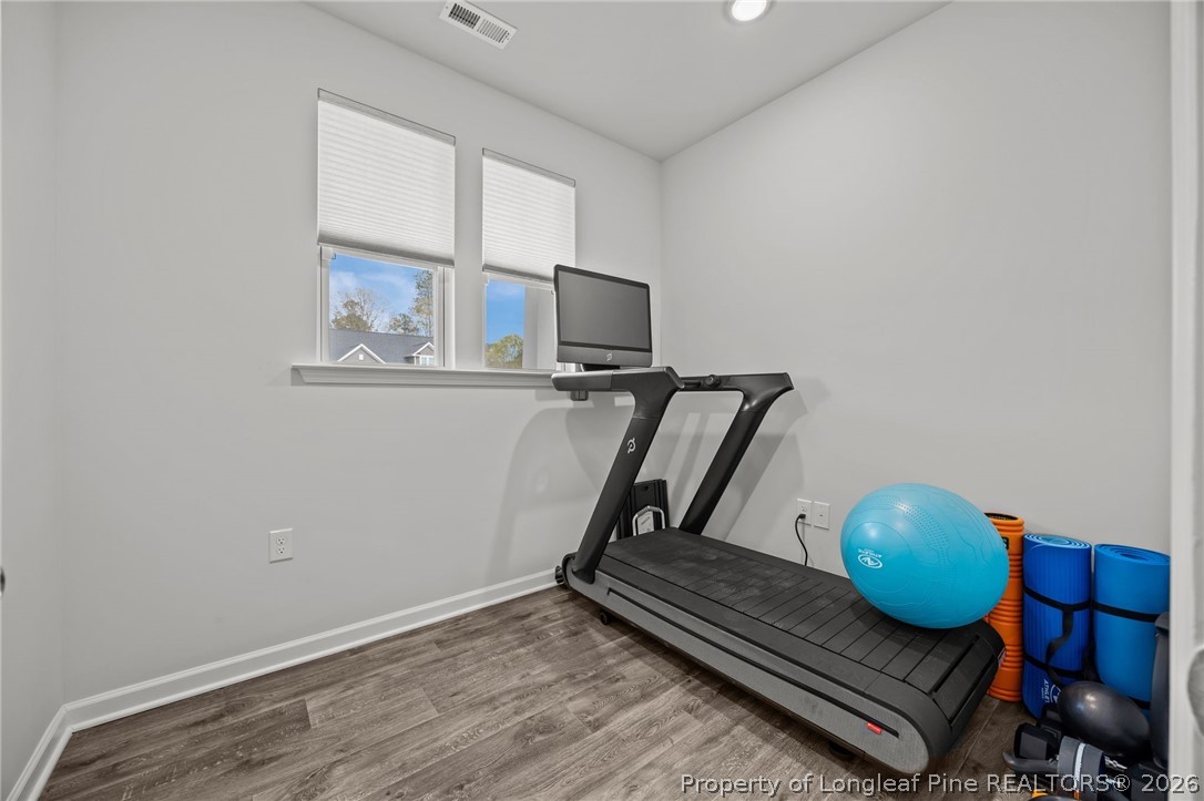 334 Beacon Hl Road Lillington, NC 27546 - Photo 6 of 49 a room with gym equipment