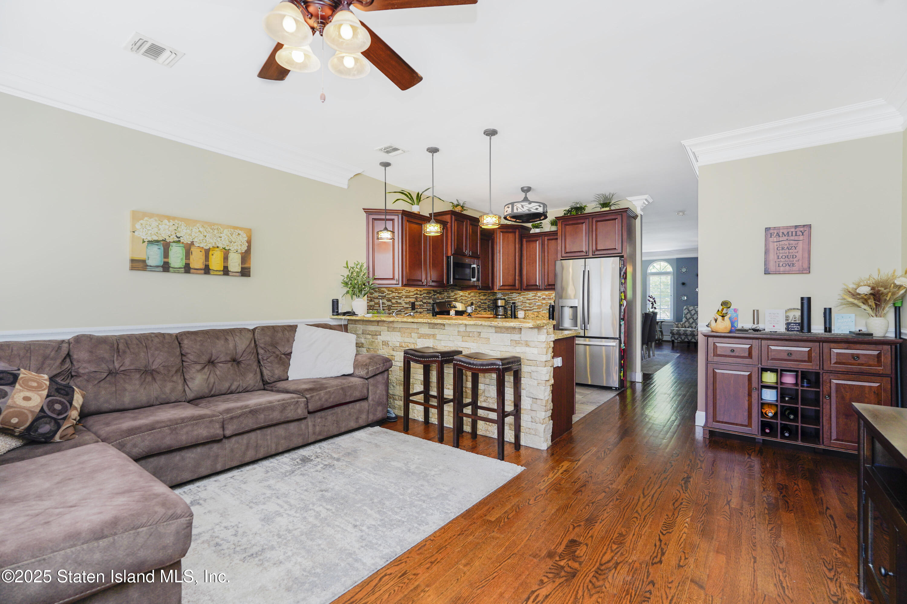 84 Presentation Circle Staten Island, NY 10312 - Photo 12 of 35 a living room with furniture and wooden floor