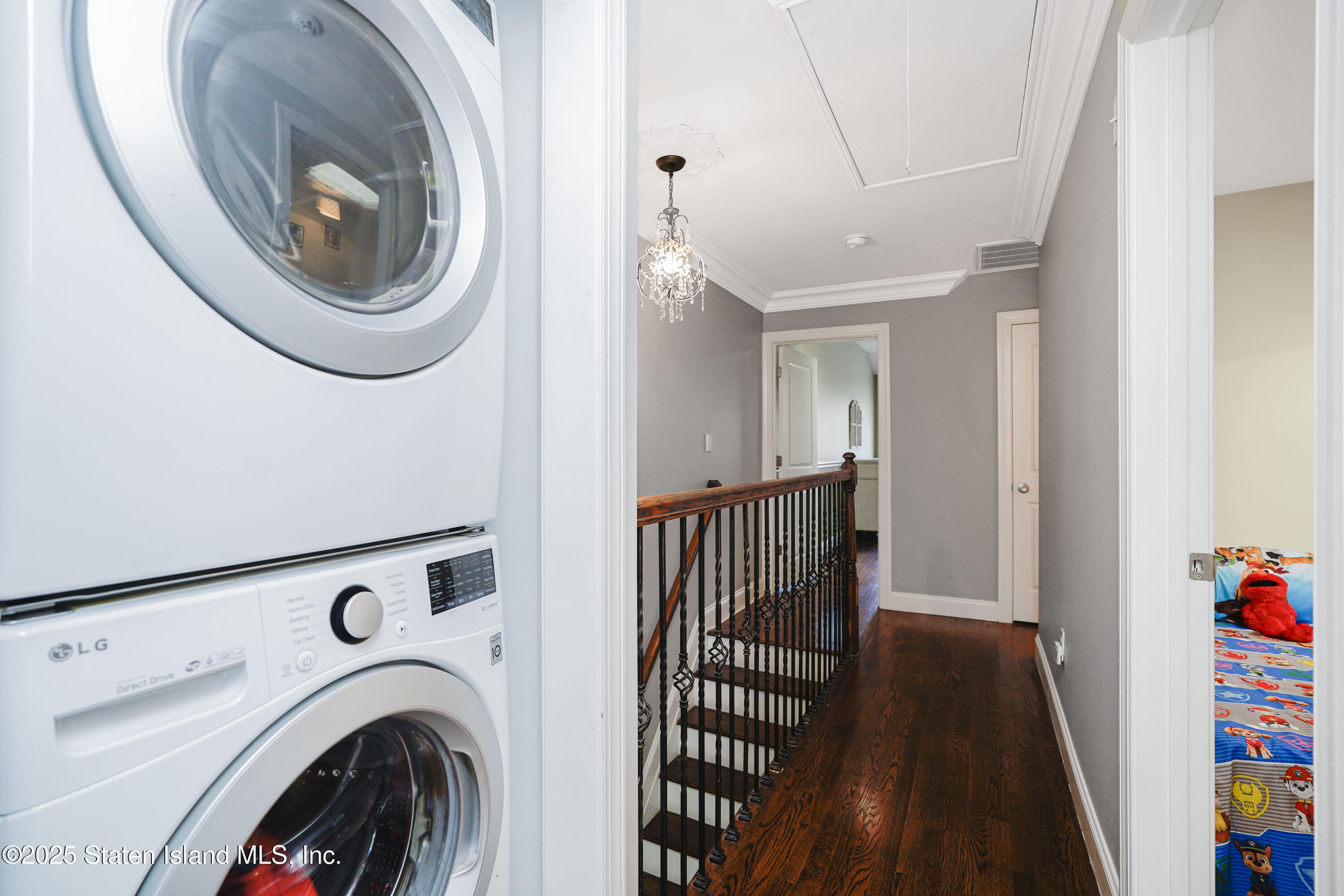 84 Presentation Circle Staten Island, NY 10312 - Photo 24 of 35 a view of a hallway with washer and dryer