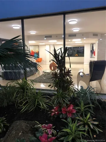 a view of an outdoor space and tennis court