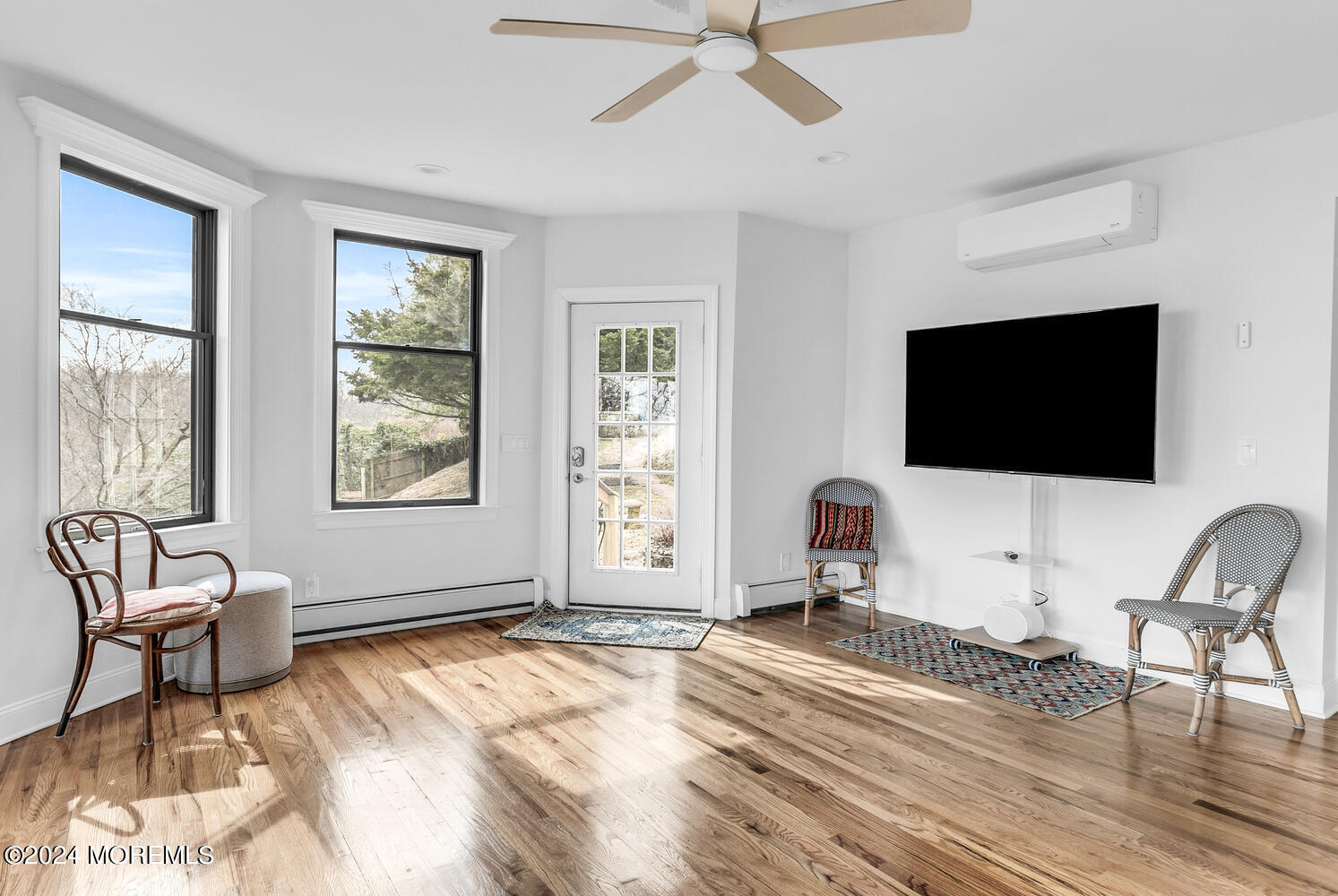 157 Portland Road Highlands, NJ 07732 - Photo 20 of 63 a living room with furniture and a flat screen tv
