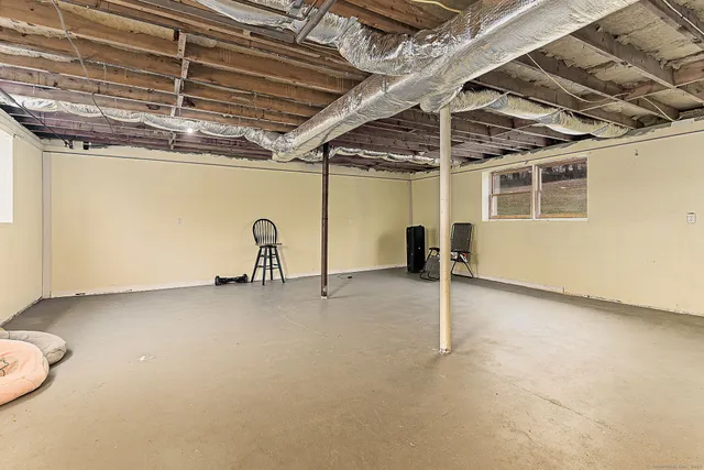 a view of a room with wooden racks