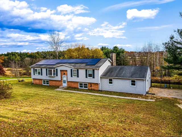 a view of a city with an ocean