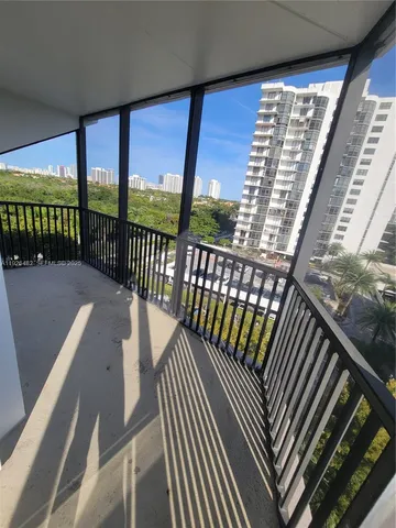 a view of balcony with furniture