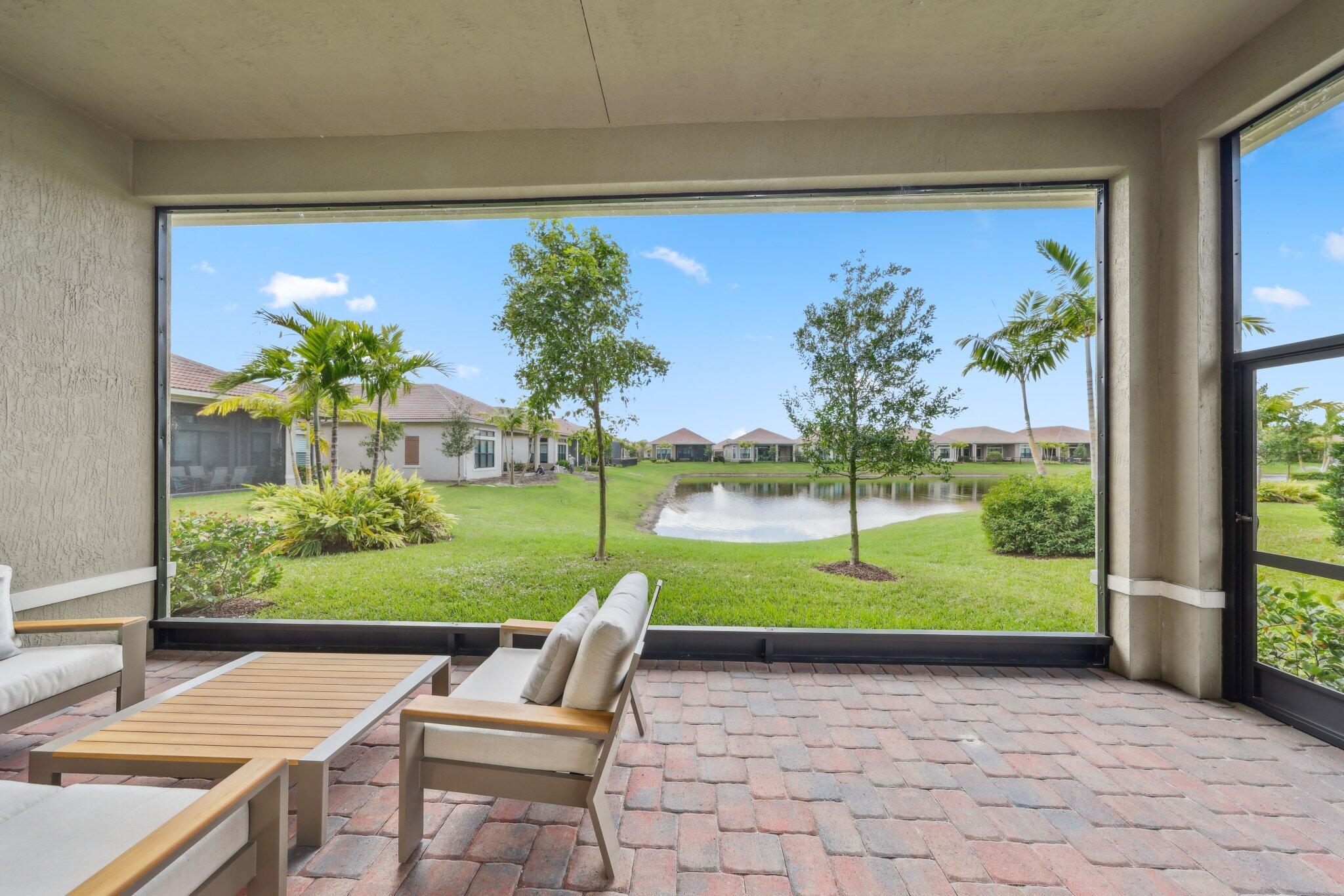 11786 Vivar Run Parkland, FL 33076 - Photo 16 of 46 a view of yard with patio