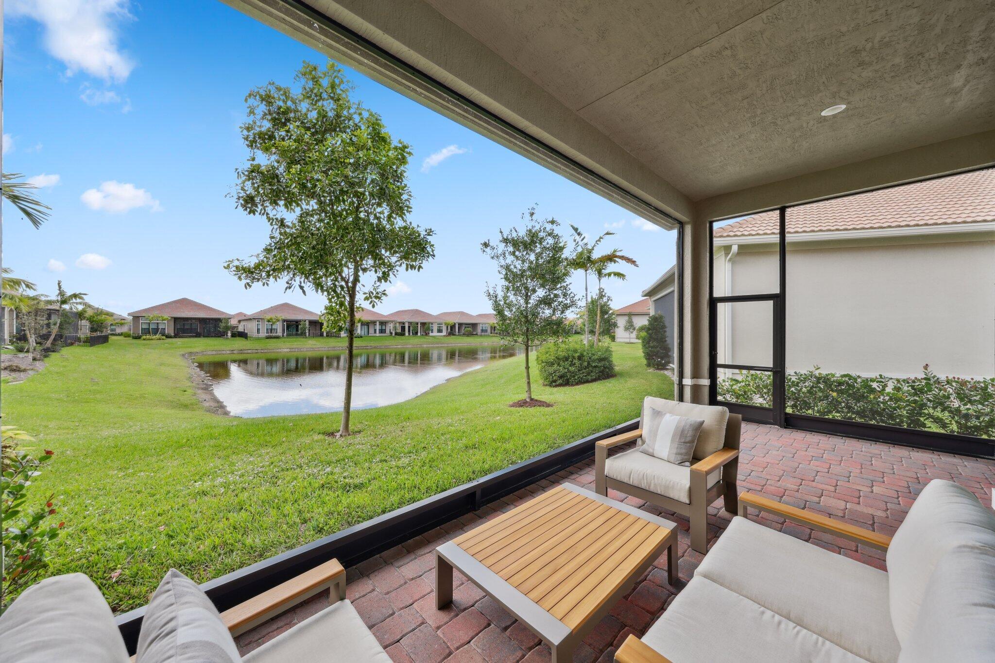 11786 Vivar Run Parkland, FL 33076 - Photo 19 of 46 a view of swimming pool with a patio
