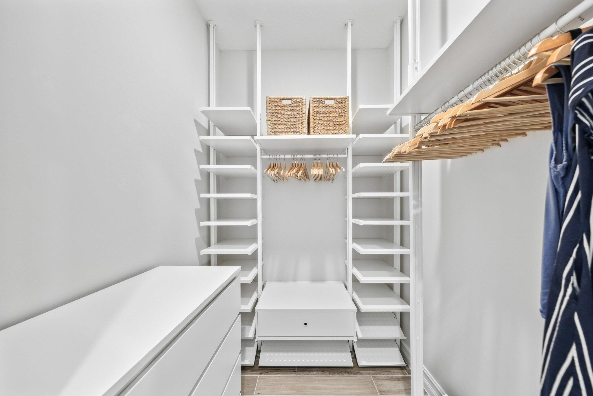 11786 Vivar Run Parkland, FL 33076 - Photo 23 of 46 a view of walk in closet with empty racks