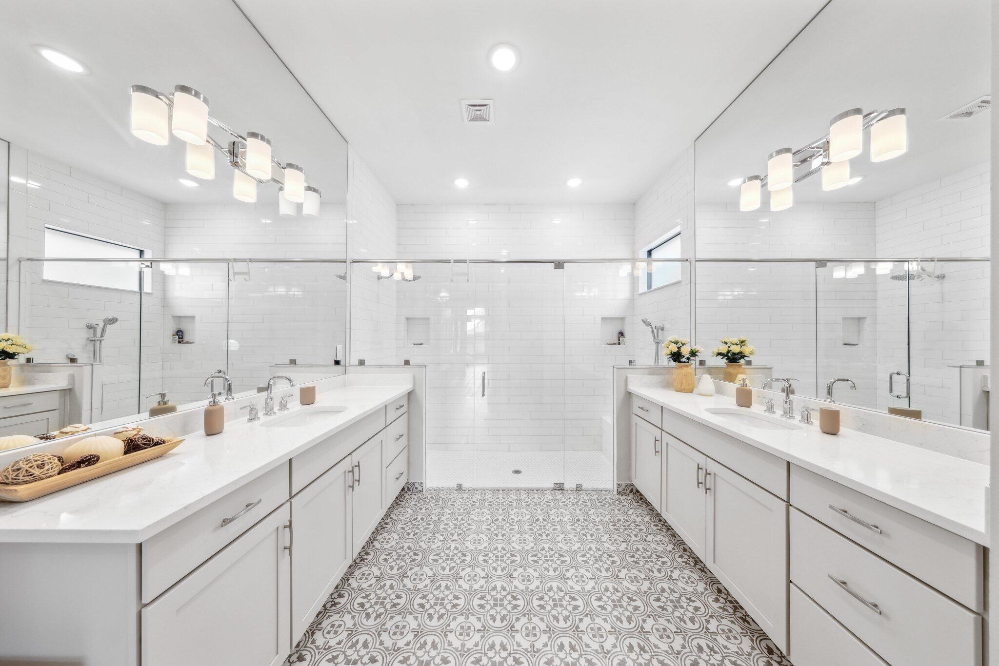 11786 Vivar Run Parkland, FL 33076 - Photo 24 of 46 a large bathroom with a double vanity sink mirror and