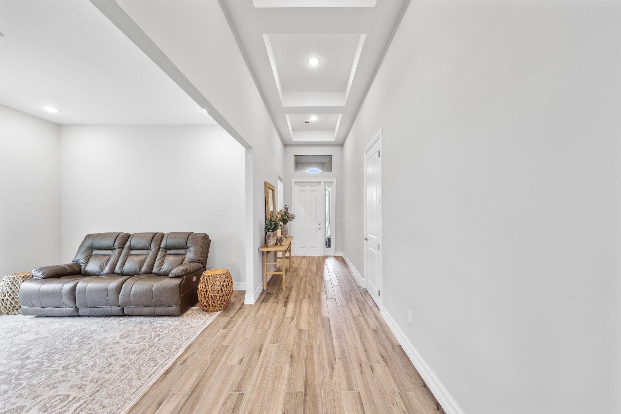 11786 Vivar Run Parkland, FL 33076 - Photo 28 of 46 a living room with furniture and a couch