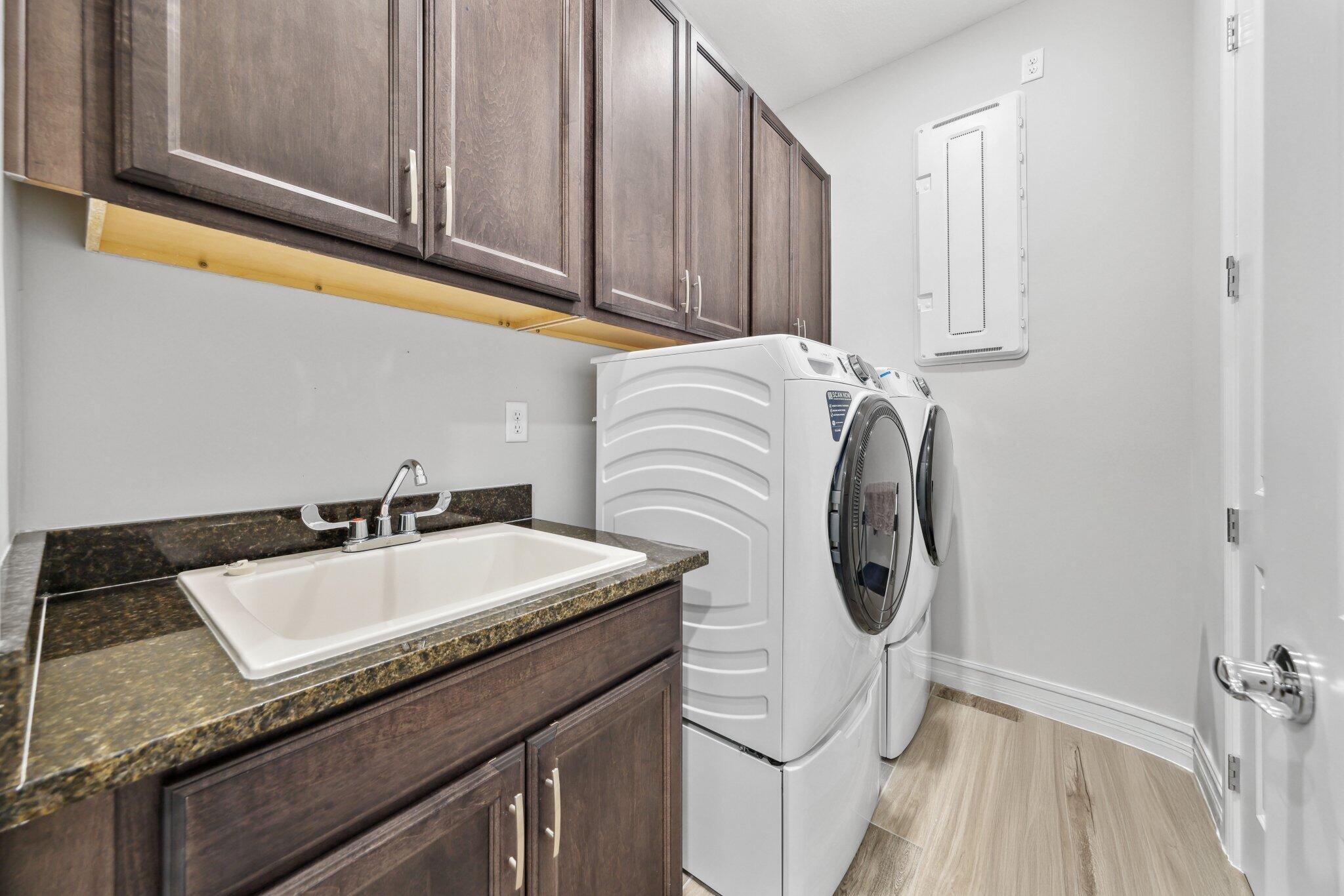 11786 Vivar Run Parkland, FL 33076 - Photo 35 of 46 a bathroom with a granite countertop sink and a mirror