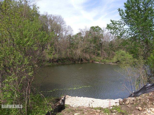 Tbd Sumner Road Pecatonica, IL 61085 - Photo 4 of 7 a view of a lake from a yard