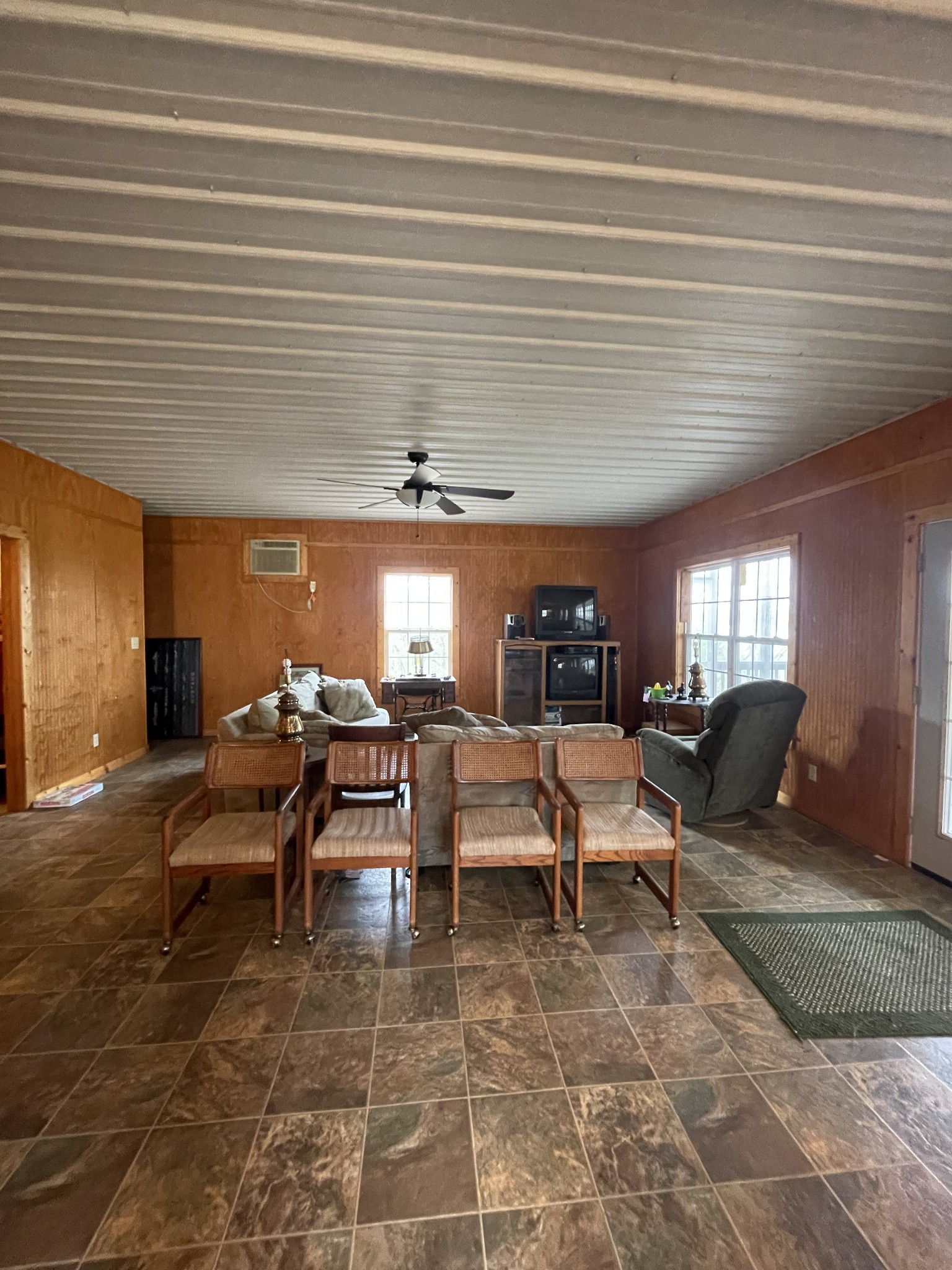 1733 Pump Station Road New Johnsonville, TN 37134 - Photo 11 of 20 a living room with furniture and a chandelier