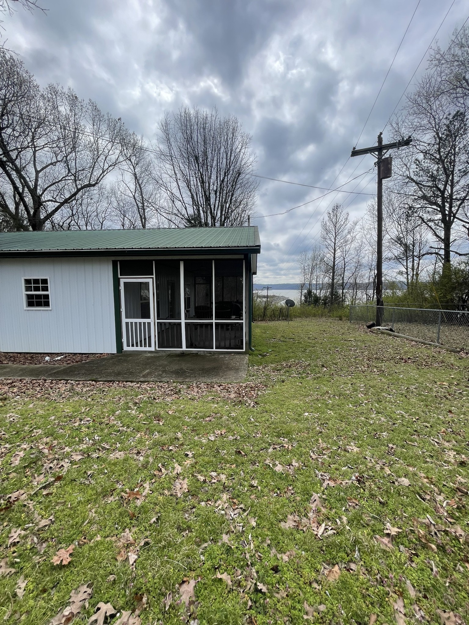 1733 Pump Station Road New Johnsonville, TN 37134 - Photo 15 of 20 a house view with a garden space