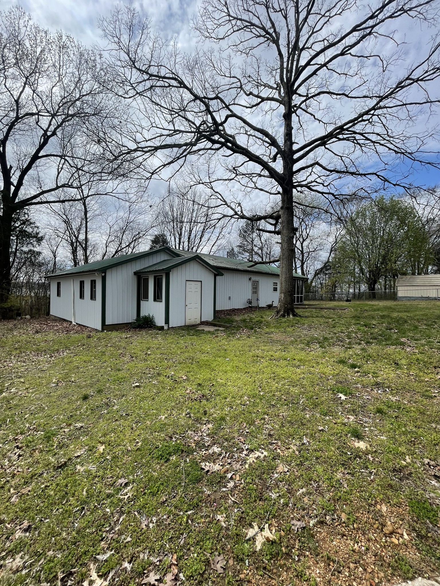 1733 Pump Station Road New Johnsonville, TN 37134 - Photo 16 of 20 a view of a house with a yard