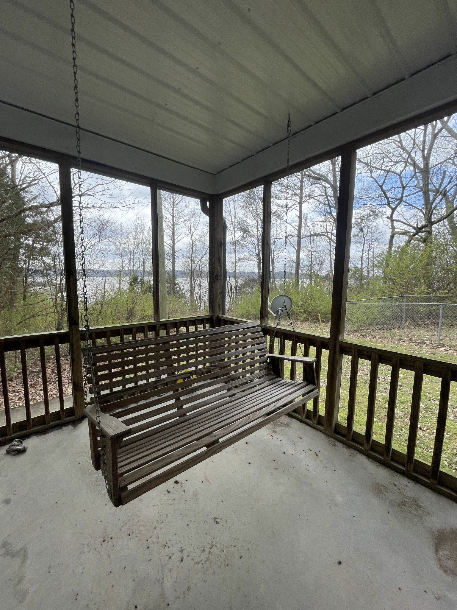 1733 Pump Station Road New Johnsonville, TN 37134 - Photo 6 of 20 a view of a porch with wooden floor and outdoor space