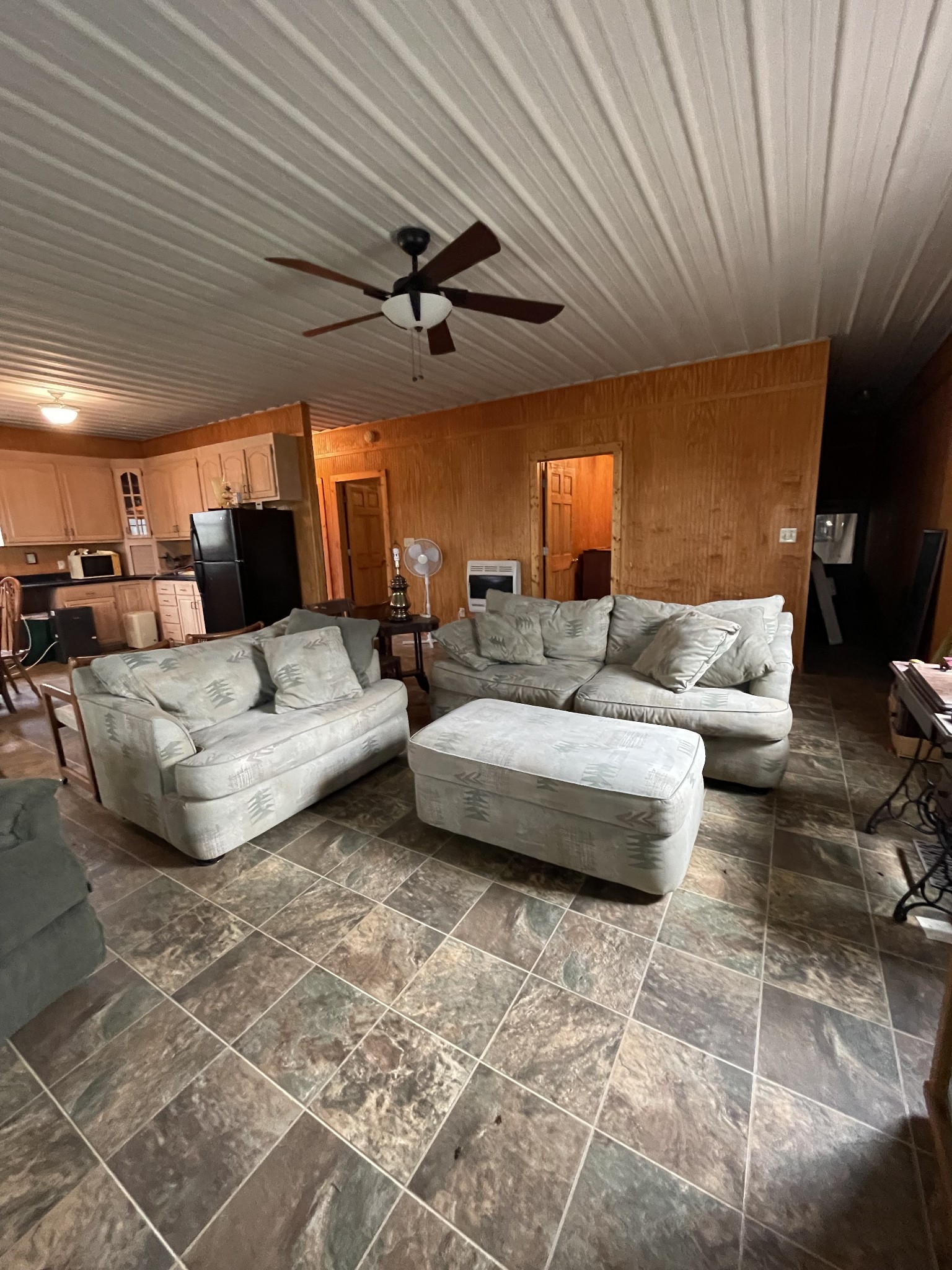1733 Pump Station Road New Johnsonville, TN 37134 - Photo 8 of 20 a bedroom with furniture and a ceiling fan