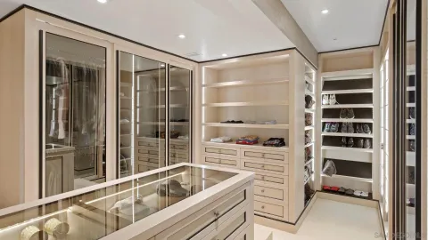 a bathroom with a double vanity sink and mirror