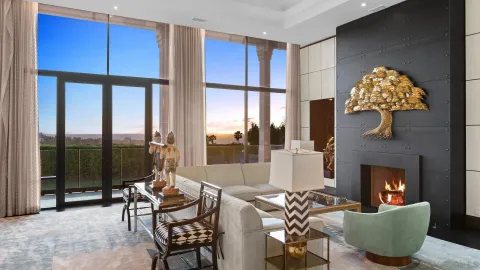 a view of a house with swimming pool and porch