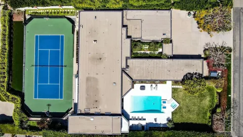 a view of a backyard with a garden and plants