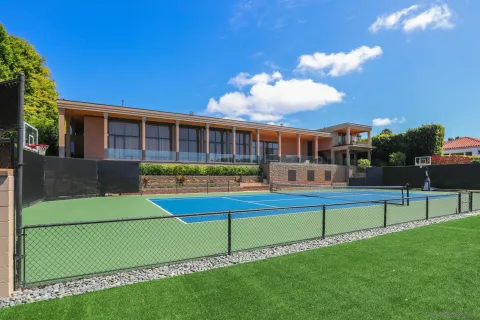a view of a patio with swimming pool table and chairs