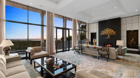 a view of a pathway with a tree in front of it