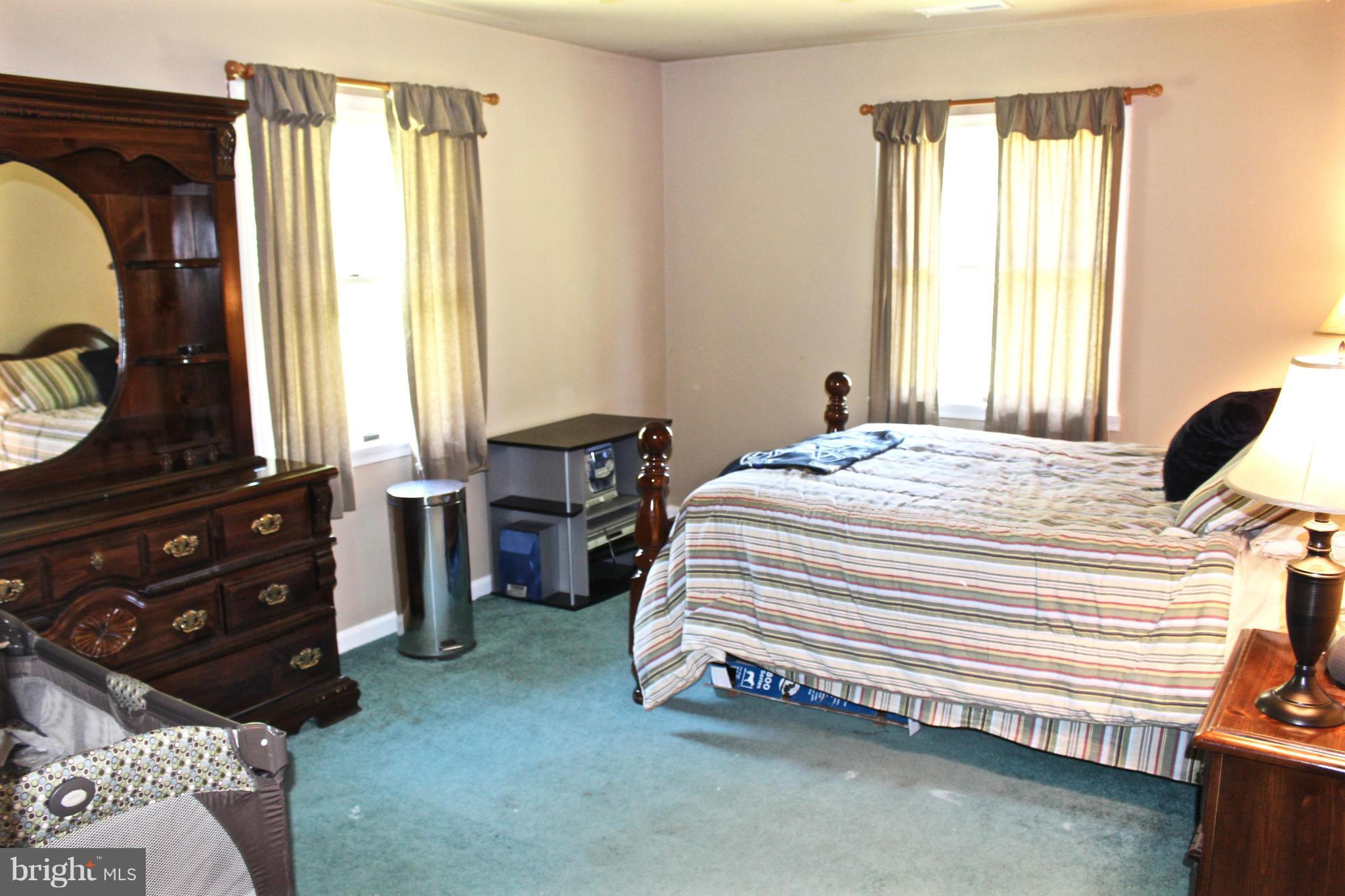 490 Swaggers Point Road Solomons, MD 20688 - Photo 17 of 27 Bedroom with Walk-in Closet