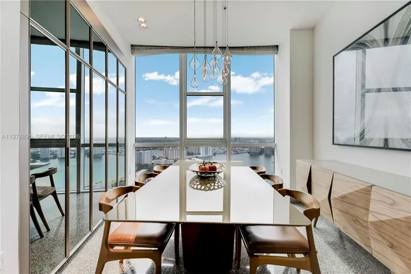 a view of a large kitchen with a large window
