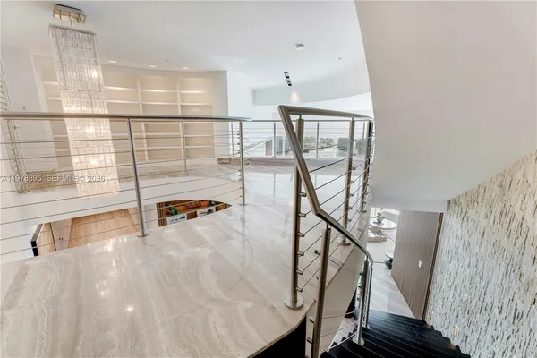 a view of a lake with a building in the background