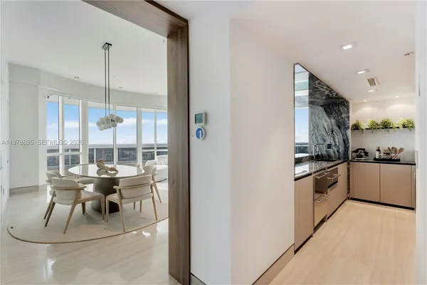 a bathroom with a bathtub and a sink