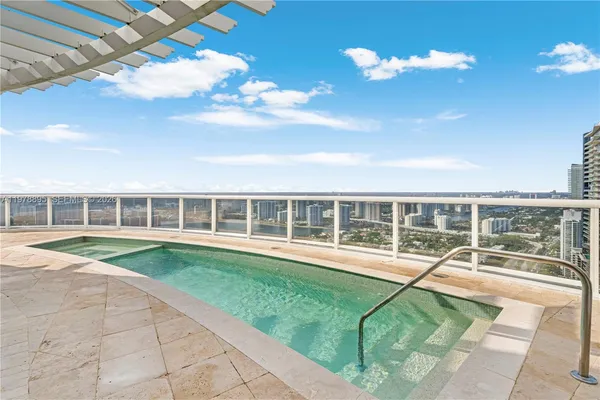 a white bath tub sitting next to a window