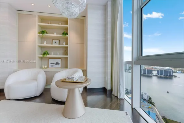 a view of a city with tall buildings in the background