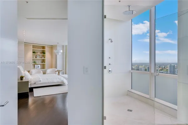 a view of a city with tall buildings