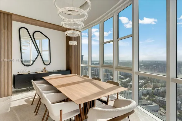 a view of a living room and dining room