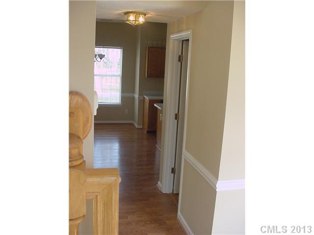 6635 Reedy Creek Road, Unit 25 Charlotte, NC 28215 - Photo 14 of 16 a bathroom with a tub shower and a sink
