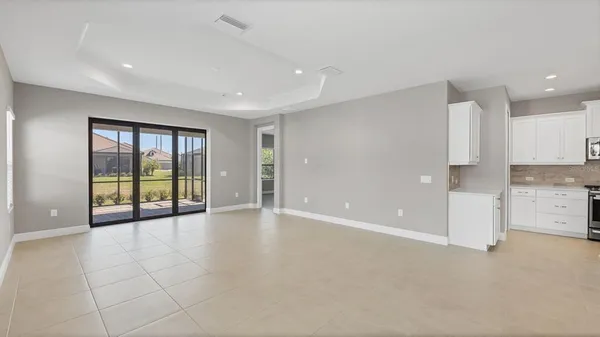 a view of an empty room with a window