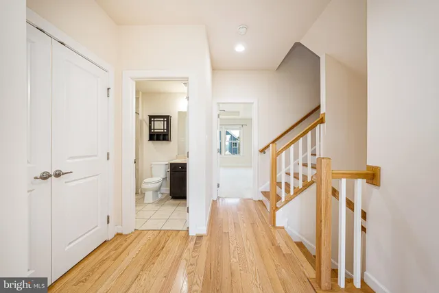 a view of a hallway with staircase