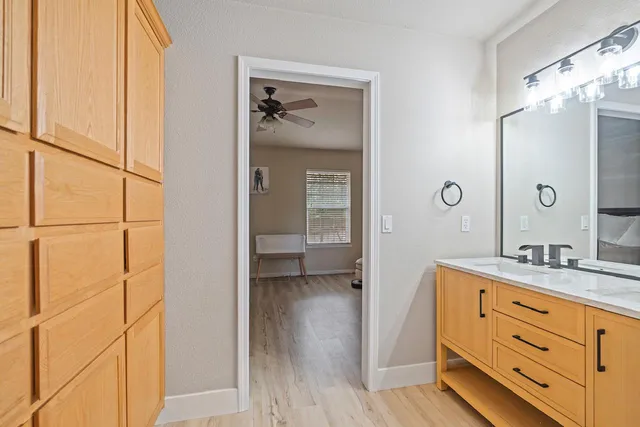 a view of bathroom with a tub and shower