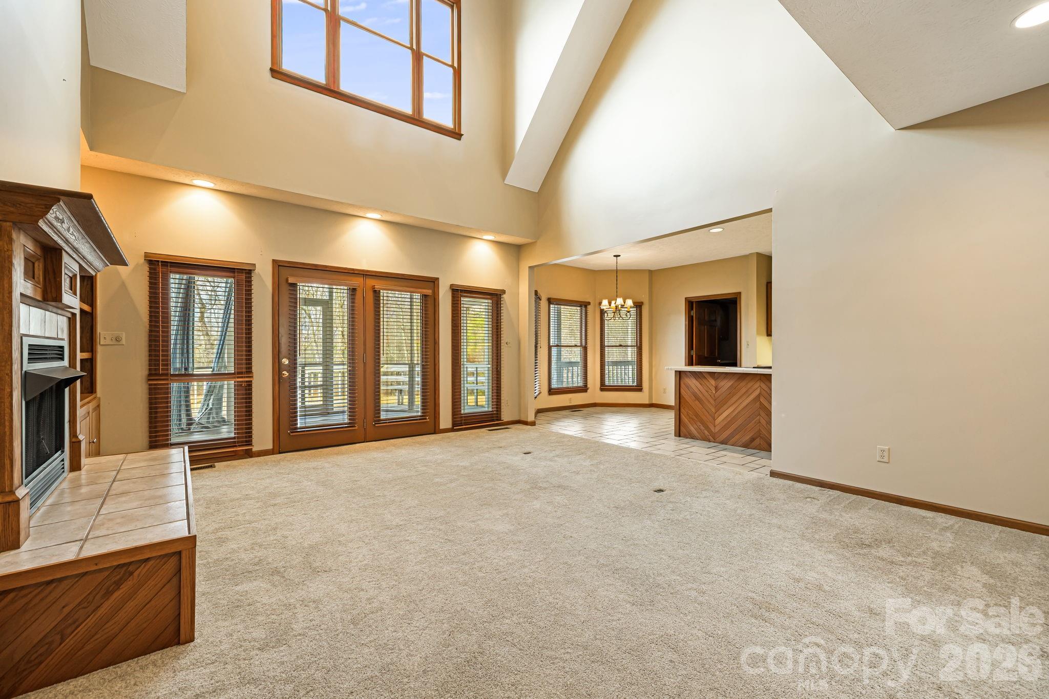 427 McCoy Cove Road Black Mountain, NC 28711 - Photo 11 of 47 a view of an empty room with a window