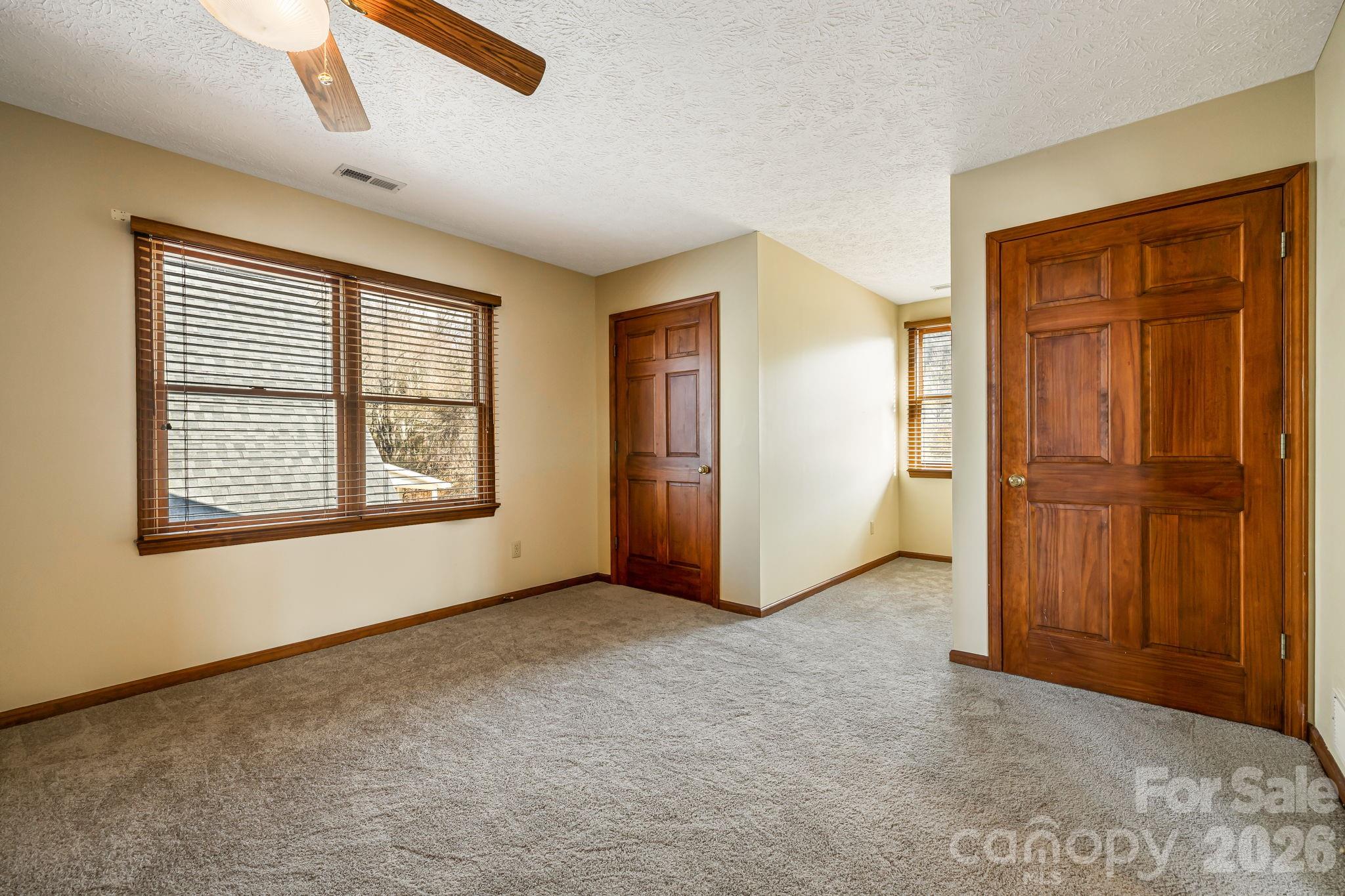 427 McCoy Cove Road Black Mountain, NC 28711 - Photo 29 of 47 an empty room with windows
