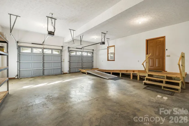 a view of a garage with furniture