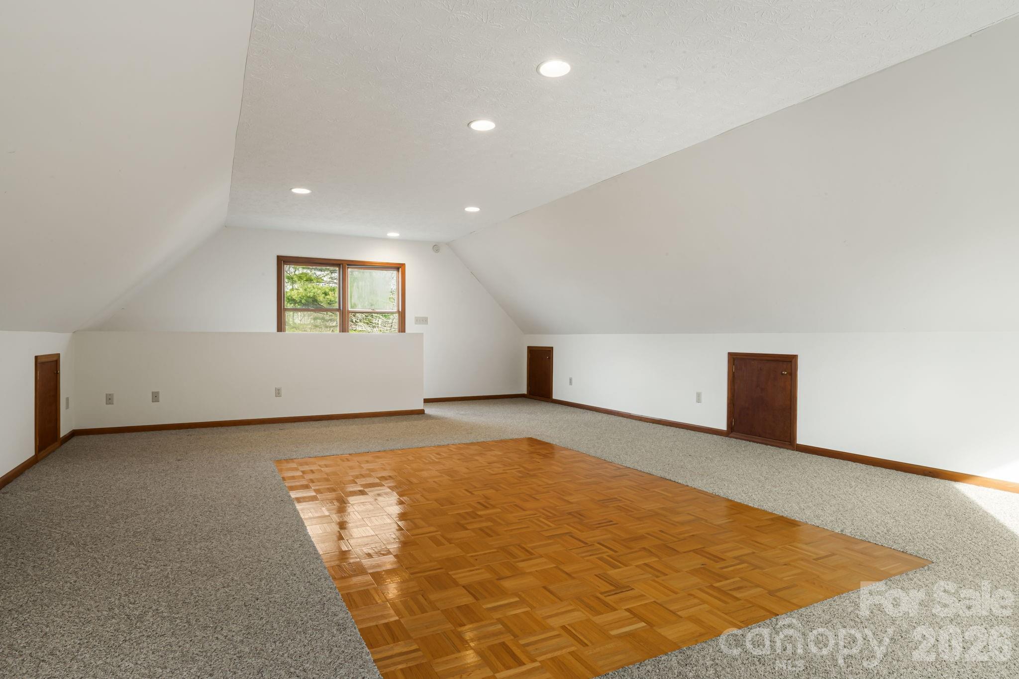 427 McCoy Cove Road Black Mountain, NC 28711 - Photo 33 of 47 a view of an empty room with a window