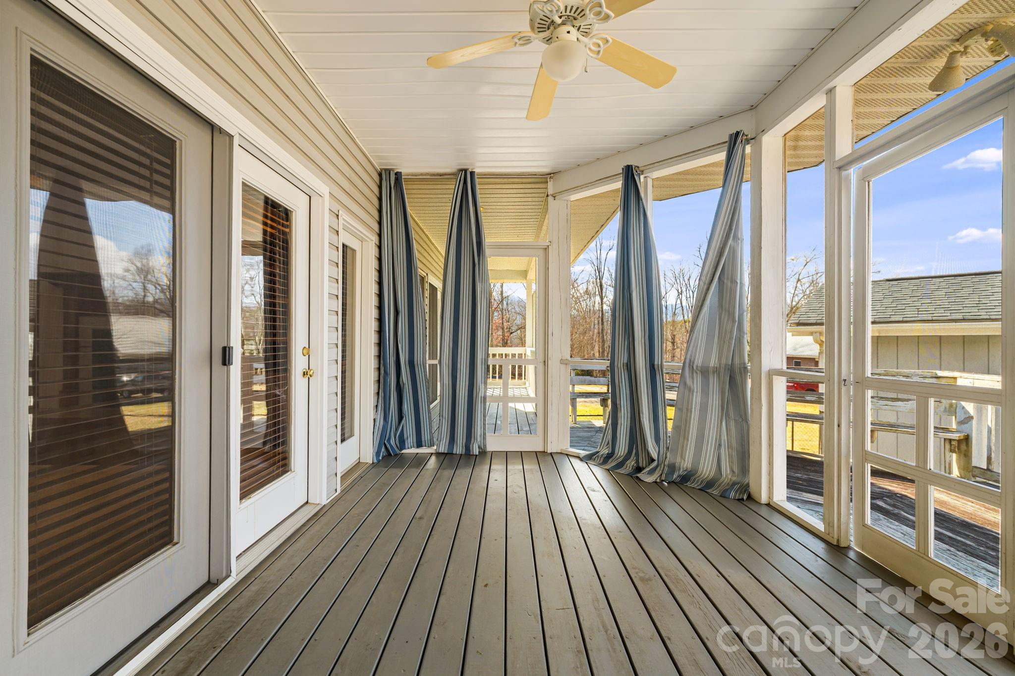 427 McCoy Cove Road Black Mountain, NC 28711 - Photo 34 of 47 a view of a balcony with wooden floor